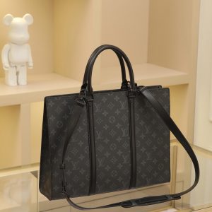 Alternative view of M45265 Black Floral [Exclusive Background] Sac Plat Horizontal Zippé Briefcase Crafted from Monogram Eclipse canvas and leather, embossed lettering and Monogram tags pay homage to heritage. Clean lines redefine business-casual style, while leather handles ensure comfortable carry. Dimensions: 31.0 x 39.0 x 8.5 cm